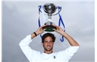EASTBOURNE, ENGLAND - JUNE 22: (EXCLUSIVE COVERAGE) Feliciano Lopez of Spain poses with the trophy after defeating Gilles Simon of France during his men's singles final match on day eight of the AEGON International tennis tournament at Devonshire Park on June 22, 2013 in Eastbourne, England.  (Photo by Jan Kruger/Getty Images)